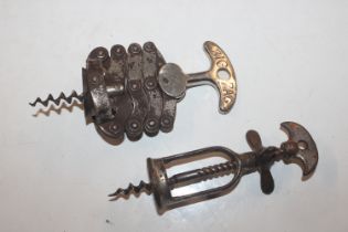 A vintage zig zag corkscrew and one other