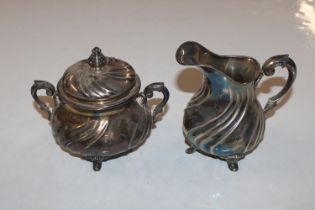 A 925 silver sugar bowl and cover, with matching c