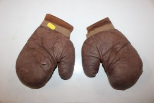 A pair of vintage children's boxing gloves