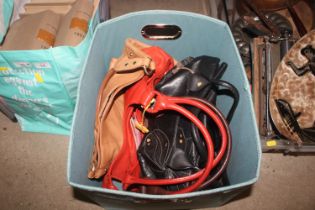 Four Radley handbags and two original Radley dust