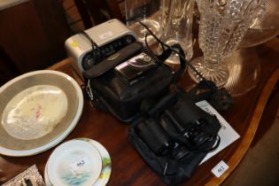 An Audiowave DAB radio and Canon digital camera; and a pair of Halina 8x 30 binoculars