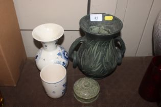 A Spanish pottery green twin handled vase; a small