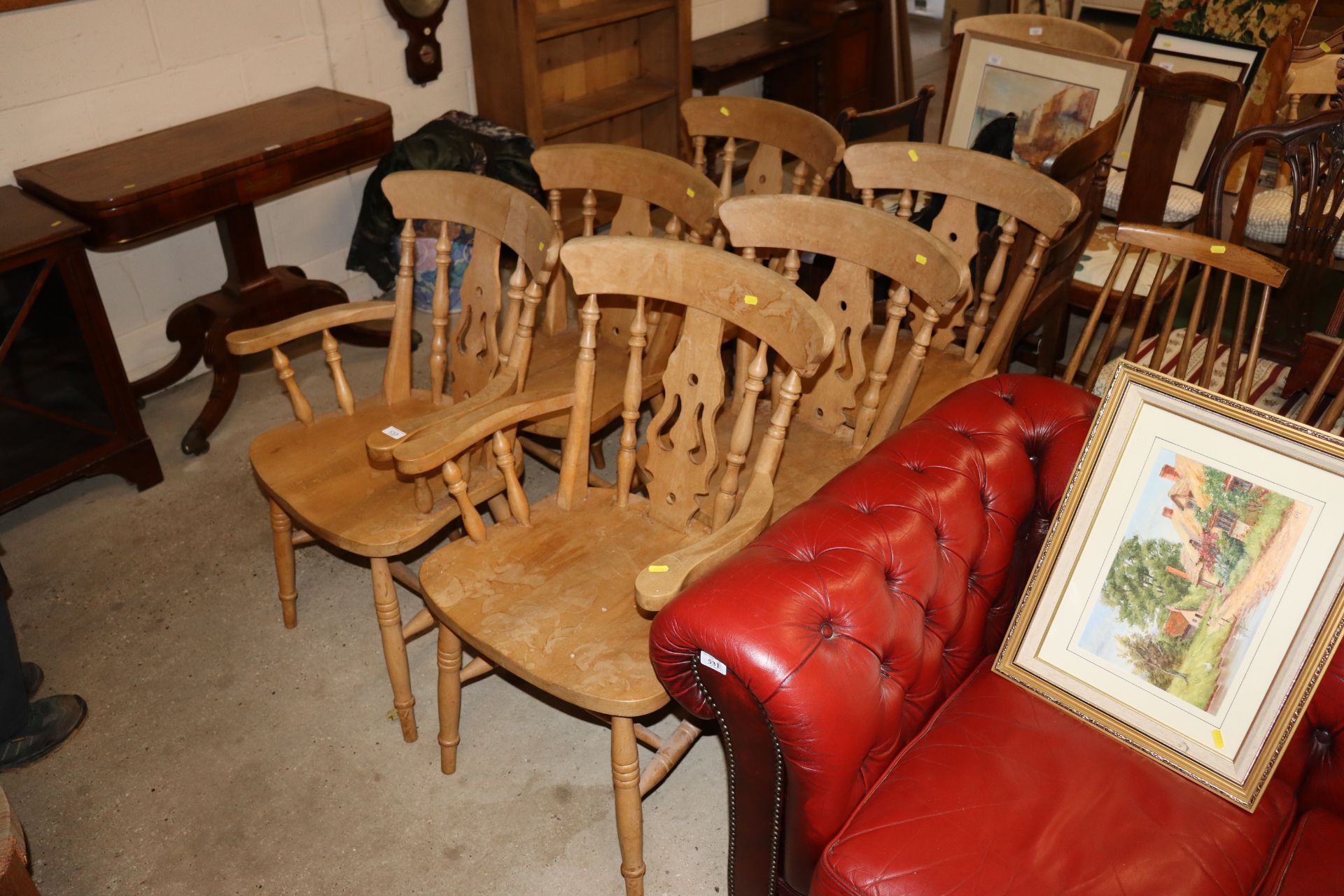 A set of six beech dining chairs comprising two ca