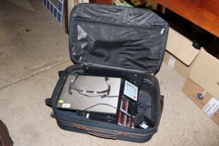 A suitcase and contents of electronic scales