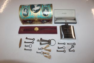A dome topped box containing old keys, hip flask, Parker fountain pen, a pen knife and a Raymond