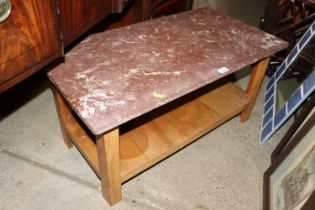 An oak and marble topped coffee table