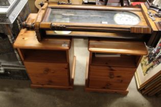 A pair of two drawer bedside chests