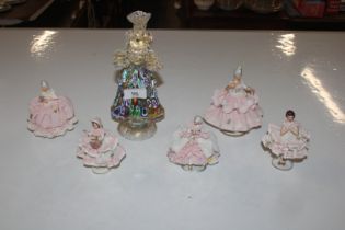 A Murano style glass figurine and five porcelain m