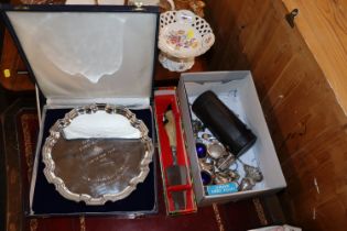 A box containing various silver plated cruet items
