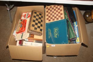 Two boxes of miscellaneous parlour games, puzzles