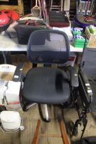 A swivel office chair with arm rests