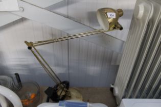 An angle poise lamp
