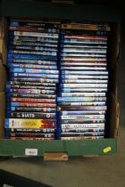 A box of various BluRay and other DVDs