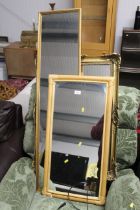 An ornate gilt framed wall mirror and two other mi