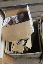 A box containing various items to include sieve, s