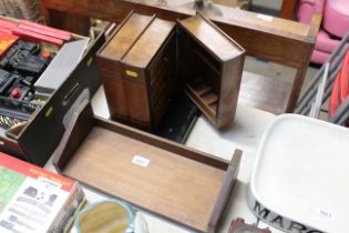 A wooden book trough; and a smokers cabinet fitted