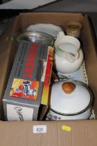 A box containing a mincer, saucepan, various china