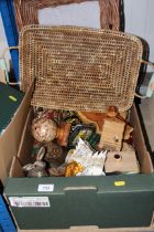 A box containing various wooden items, basket ware