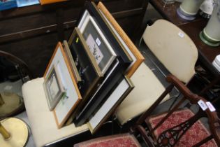 A pair of metal framed chairs