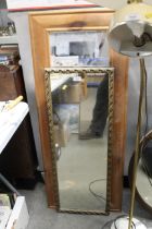 A pine framed mirror and a gilt framed mirror