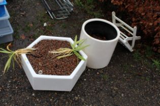 A garden water feature, a similar matching pot, pl