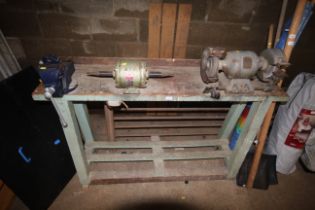 A wooden work bench with fitted Record No.0 bench