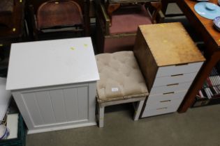 A dove tailed modern multi drawer chest with a dre