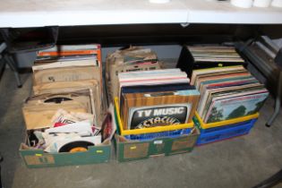 Three boxes and a case of records