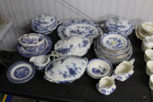 A collection of Burslem blue and white dinner ware