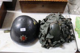 An Essex County Fire Brigade helmet; and an army h