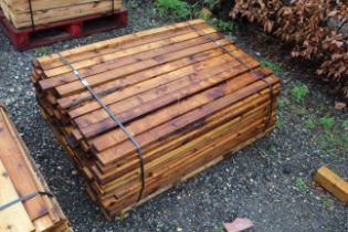 A quantity of various sawn timber lengths. This lo