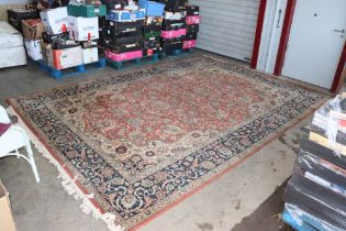 An approx. 13'8" x 9'10" patterned carpet AF