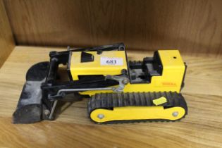 A tin plate Tonka toy