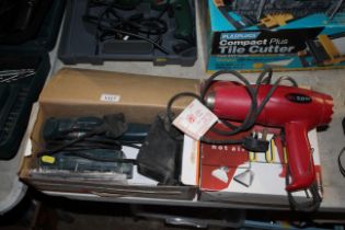 A Black & Decker KA180 sander in original box and a Power Devil hot air gun in original box