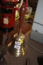 A brass hand bell