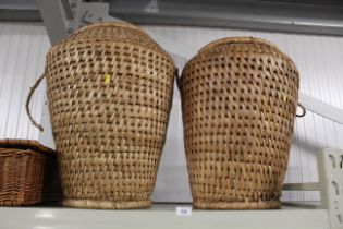 Two wicker linen baskets