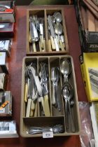 Two boxes of cutlery