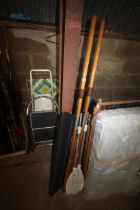 Two pairs of rowing oars and a parcel shelf