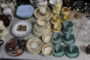 A collection of Woods ware tea ware; a collection