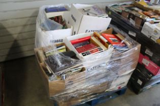 A pallet of miscellaneous books. Successful purch