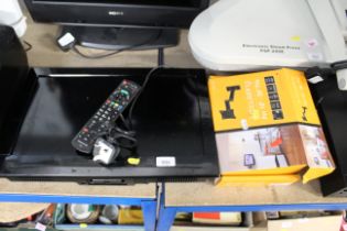 A Panasonic flat screen television with remote con