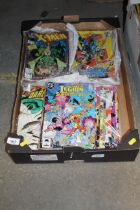 A box of DC and Marvel comics