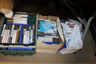 A bag and two boxes of various XBOX, PlayStation 2