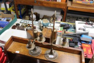 A near pair of brass table lamps