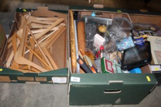 Two boxes containing various sundries, glassware, coat hangers etc.