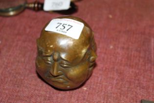 A brass four sided Buddha head (73)