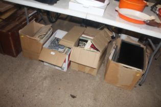 A suitcase and contents, various boxes of sheet mu