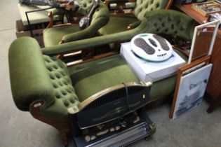 An Edwardian button down upholstered chaise longue