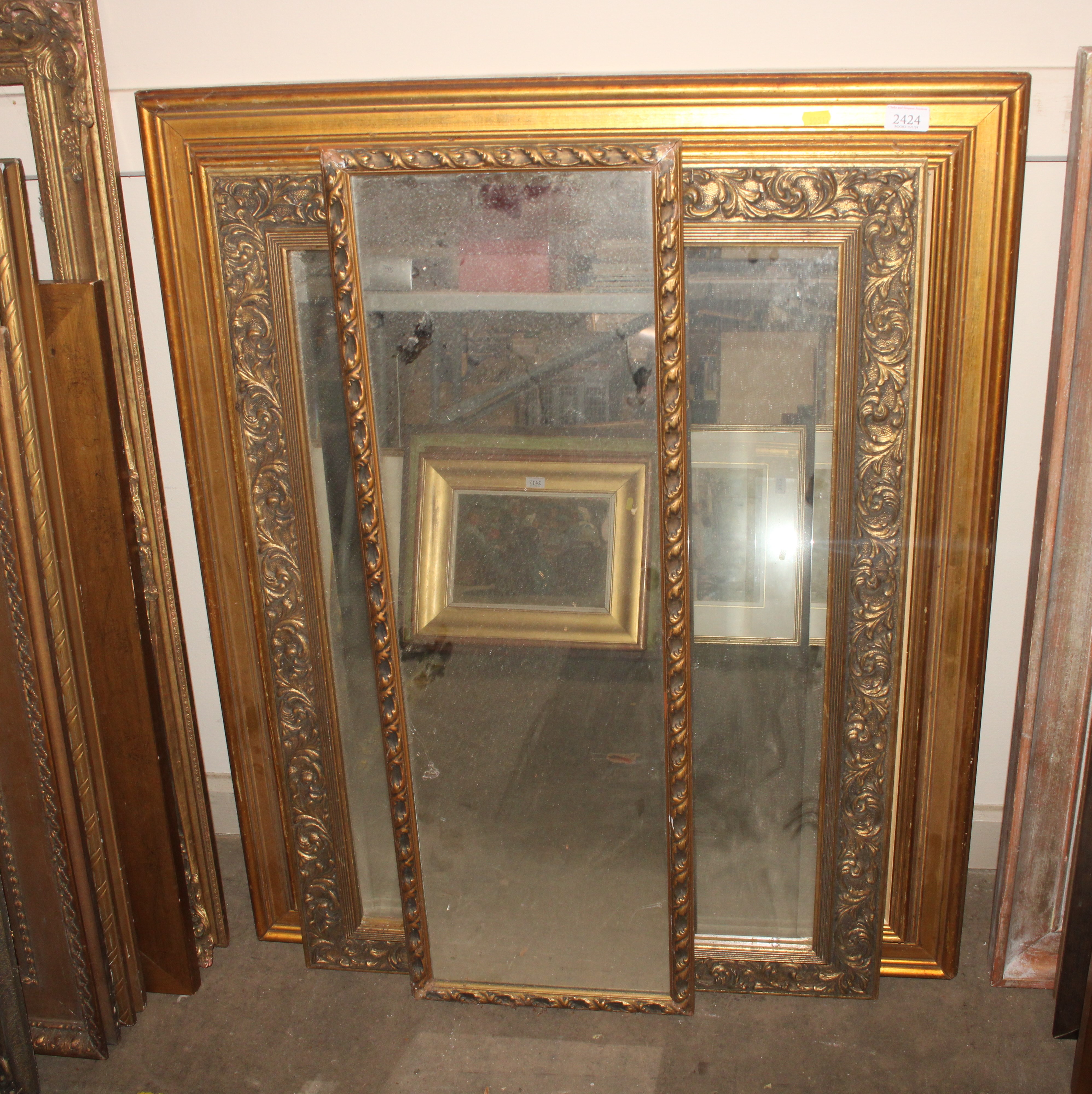 Three various gilt framed mirrors