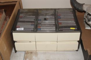 A retro cassette storage cabinet and contents of n